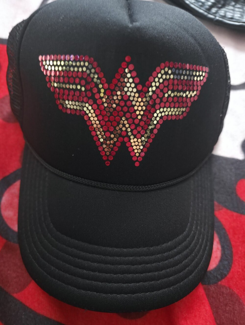 Black Trucker Hat with Red and Gold Sequin Emblem